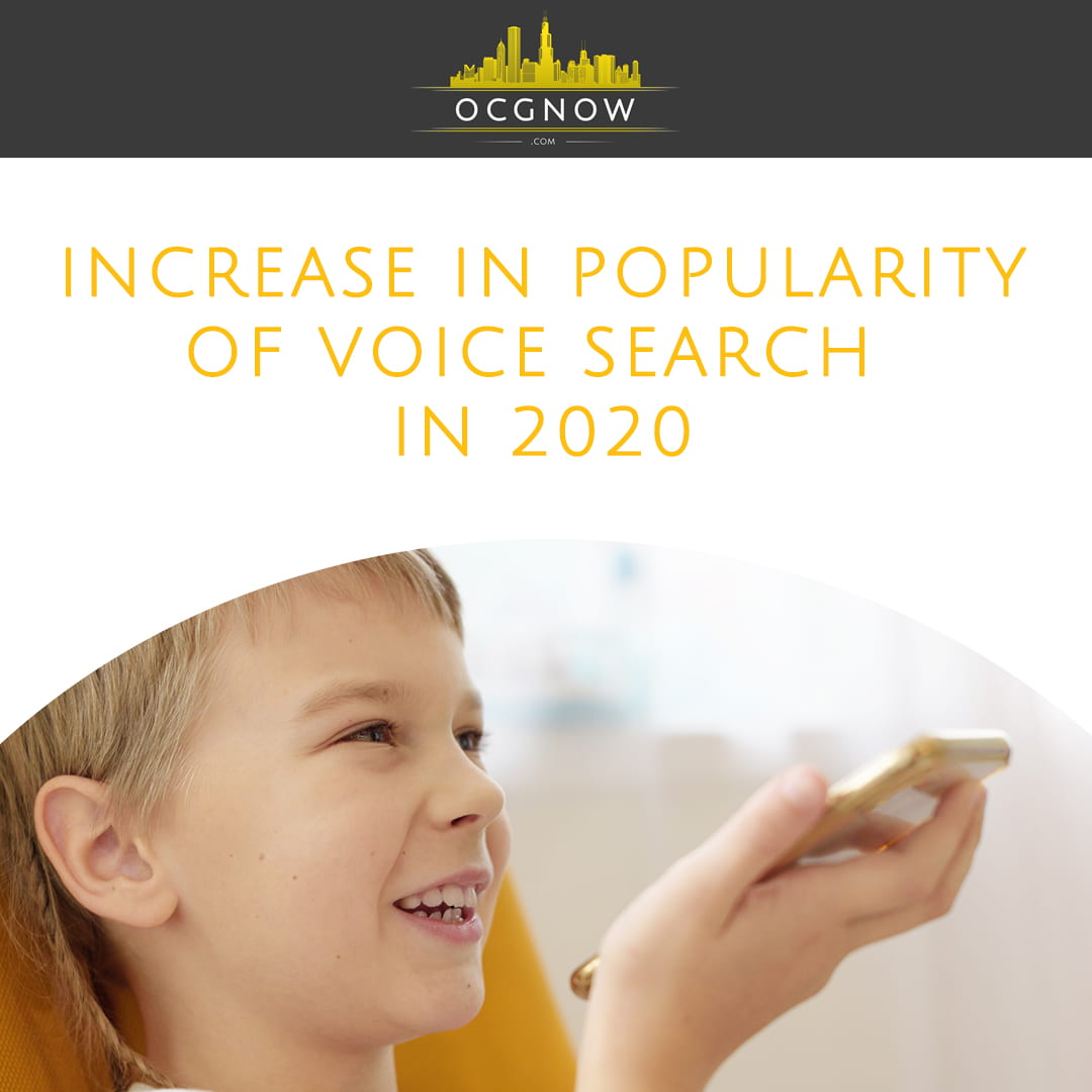 Boy using voice search in 2020 on mobile phone with his parents